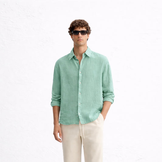 mint‑green linen shirt